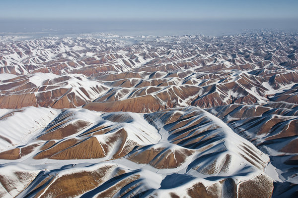 afghanistan-winter-landscape-hills-snow-aerial-vanheijst.jpg 
