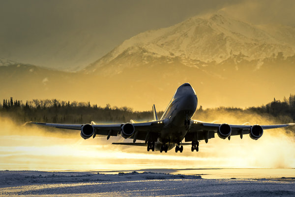 boeing-747-takeoff-anchorage-atlas-cargo-golden-sunlight-snow-blast-vanheijst.jpg 