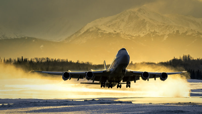 boeing-747-takeoff-anchorage-atlas-cargo-golden-sunlight-snow-blast-vanheijst.jpg