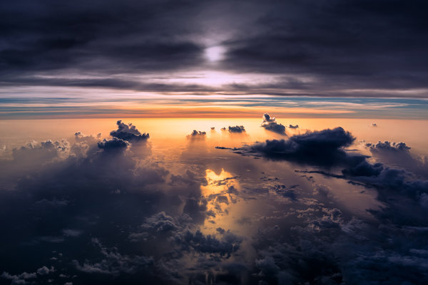 sunset-clouds-ocean-shadow-vanheijst.jpg 