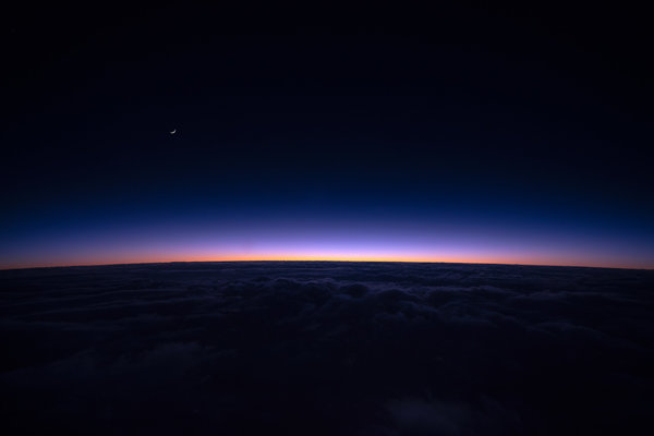 1 sunset-over-clouds-moon-horizon.jpg 